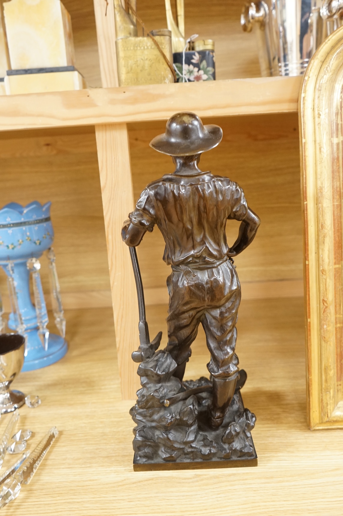 After Jean Garnier (French, 1820-1895), bronze model, ‘Worker Puller Carrier’, 43cm